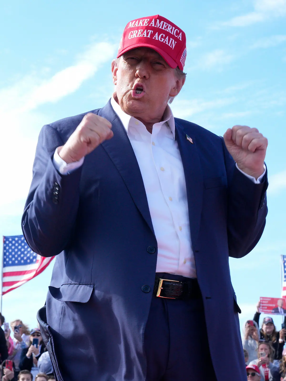Republican presidential candidate former President Donald Trump gestures to the crowd at a campaign rally Saturday, March 16, 2024, in Vandalia, Ohio. (AP Photo/Jeff Dean)