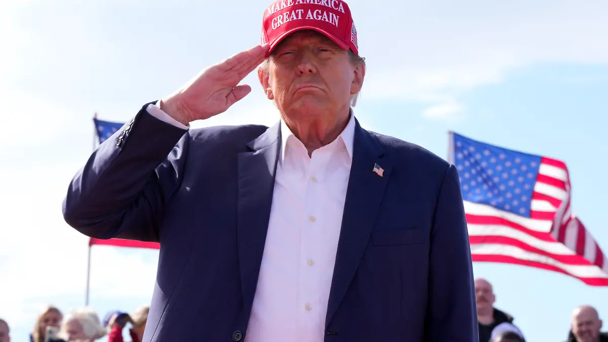 Republican presidential candidate former President Donald Trump salutes at a campaign rally Saturday, March 16, 2024, in Vandalia, Ohio. (AP Photo/Jeff Dean)