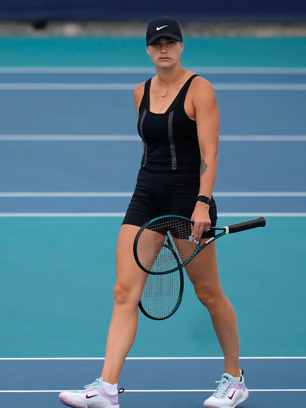 Aryna Sabalenka, of Belarus, walks on a practice court at the Miami Open tennis tournament, Wednesday, March 20, 2024, in Miami Gardens, Fla. (AP Photo/Rebecca Blackwell)