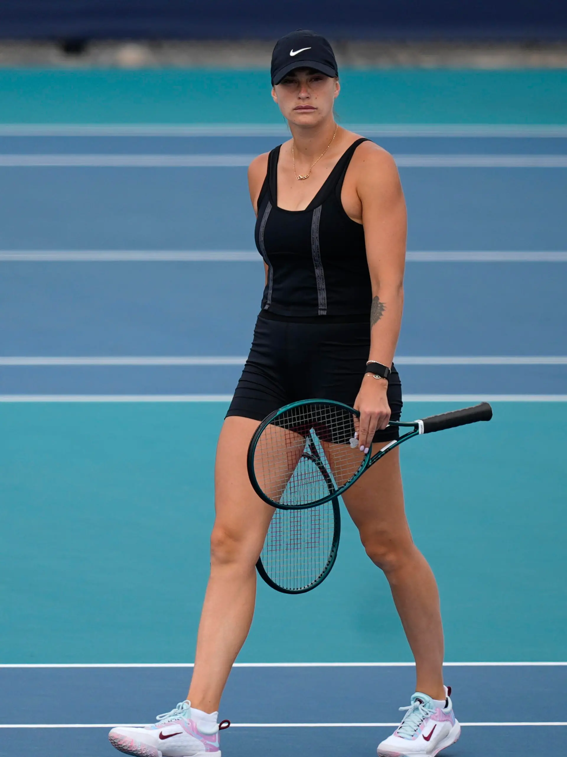 Aryna Sabalenka, of Belarus, walks on a practice court at the Miami Open tennis tournament, Wednesday, March 20, 2024, in Miami Gardens, Fla. (AP Photo/Rebecca Blackwell)