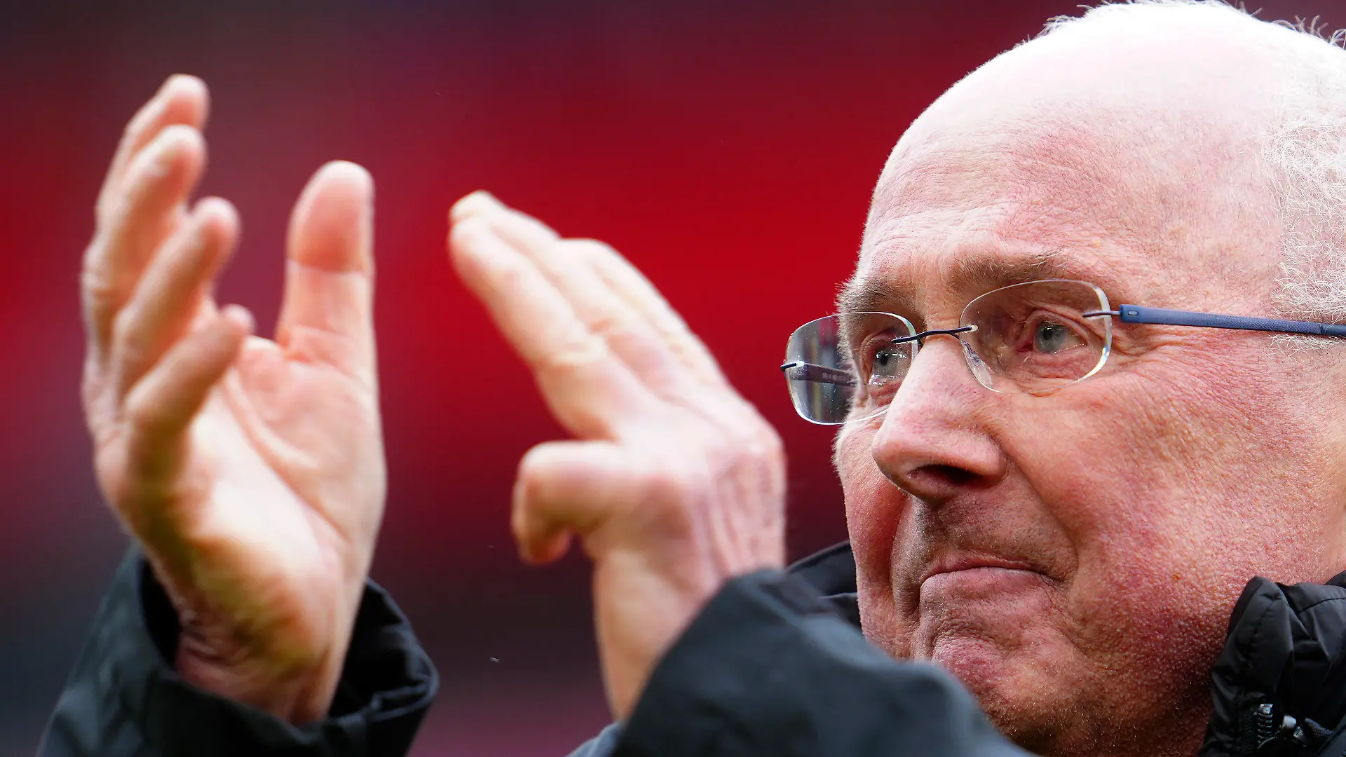 Former England manager Sven-Goran Eriksson applauds the crowd before the start of an exhibition soccer match between Liverpool Legends and Ajax Legends at Anfield Stadium, Liverpool, England, Saturday March 23, 2024. Former England boss Eriksson, who is a lifelong Liverpool fan, disclosed his terminal cancer diagnosis in January. (AP Photo/Jon Super)