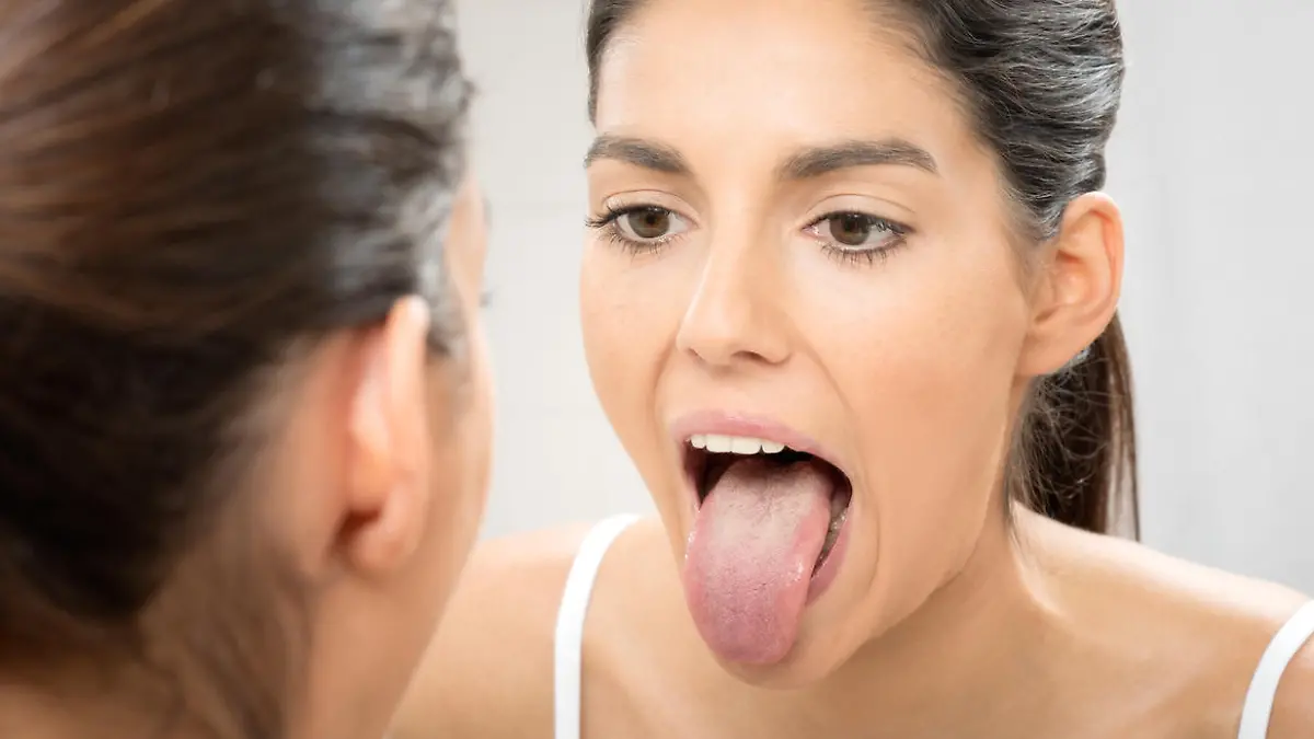Woman sticking out Tongue