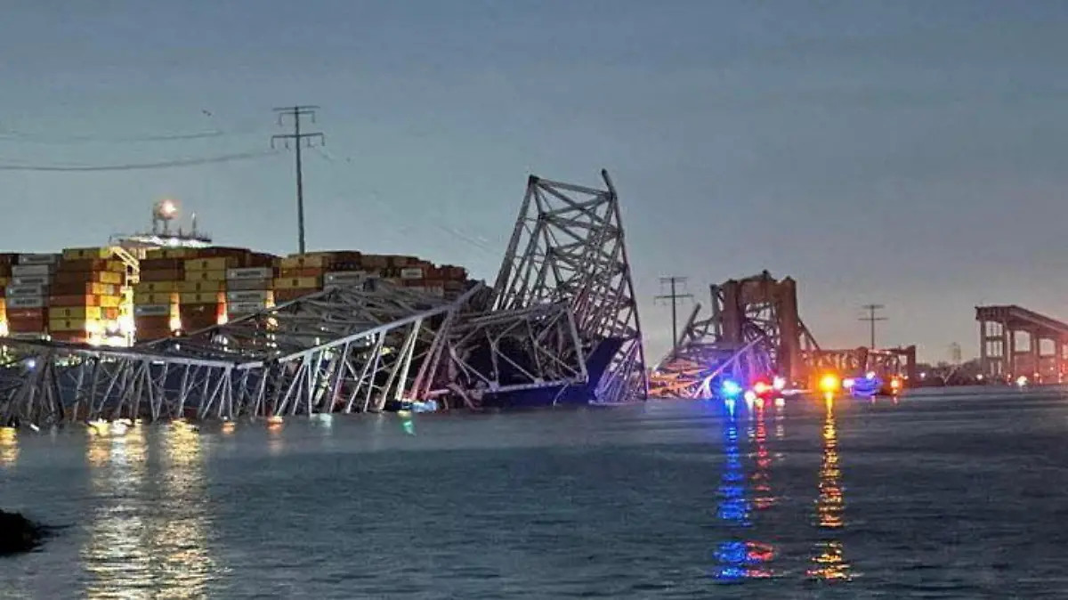 A view of the Singapore-flagged container ship 'Dali' after it collided with a pillar of the Francis Scott Key Bridge in Baltimore, Maryland, U.S., in this picture released on March 26, 2024. Harford County MD Fire & EMS/Handout via REUTERS THIS IMAGE HAS BEEN SUPPLIED BY A THIRD PARTY NO RESALES. NO ARCHIVES MANDATORY CREDIT TPX IMAGES OF THE DAY