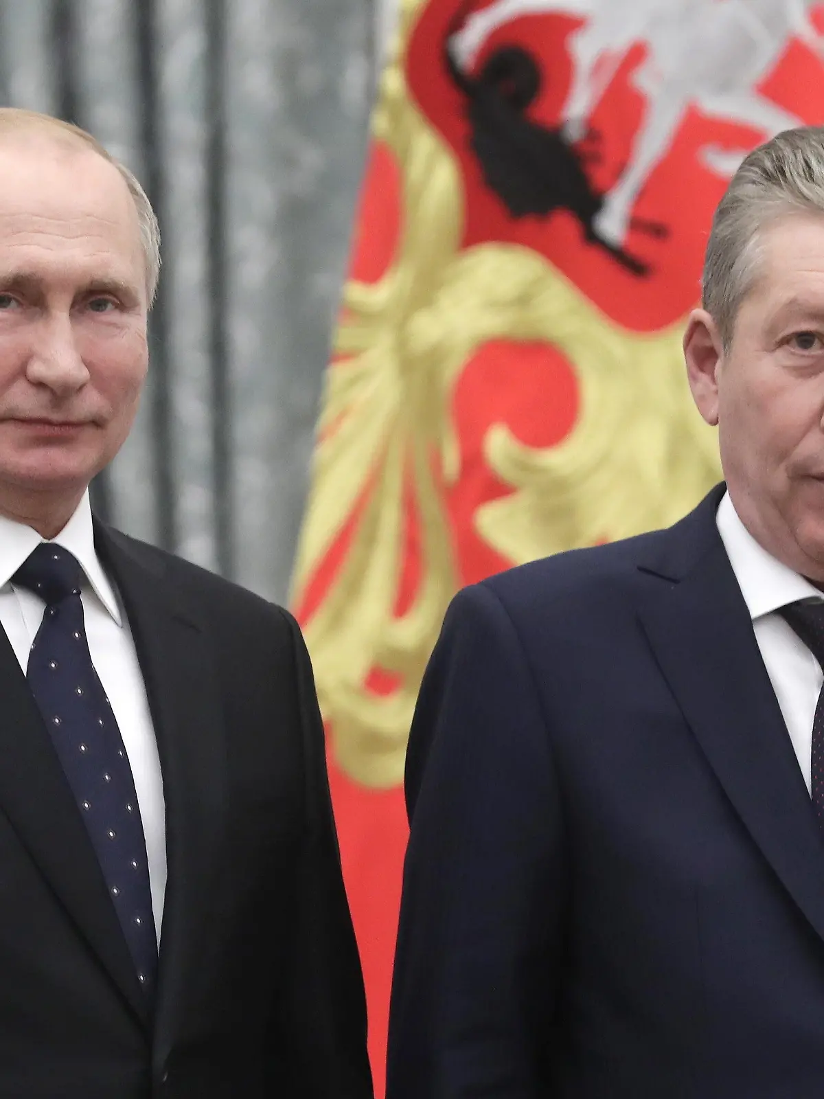 MOSCOW, RUSSIA - NOVEMBER 21, 2019: Russia's President Vladimir Putin (L) awards an Order of Alexander Nevsky to Lukoil First Executive Vice-President Ravil Maganov at a ceremony to present state decorations at the Moscow Kremlin. Mikhail Metzel/TASS