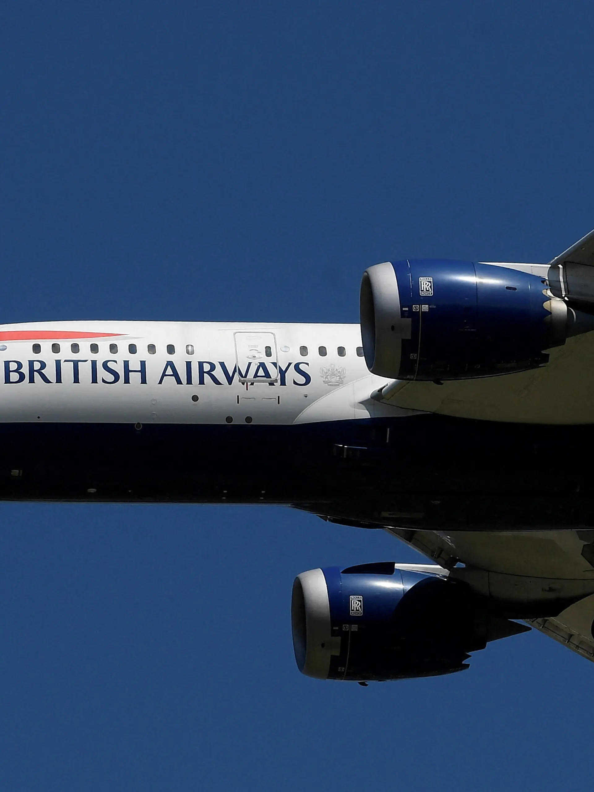 FILE PHOTO: A British Airways passenger plane comes in to land at London Heathrow airport in London, Britain, May 21, 2020. REUTERS/Toby Melville/File Photo