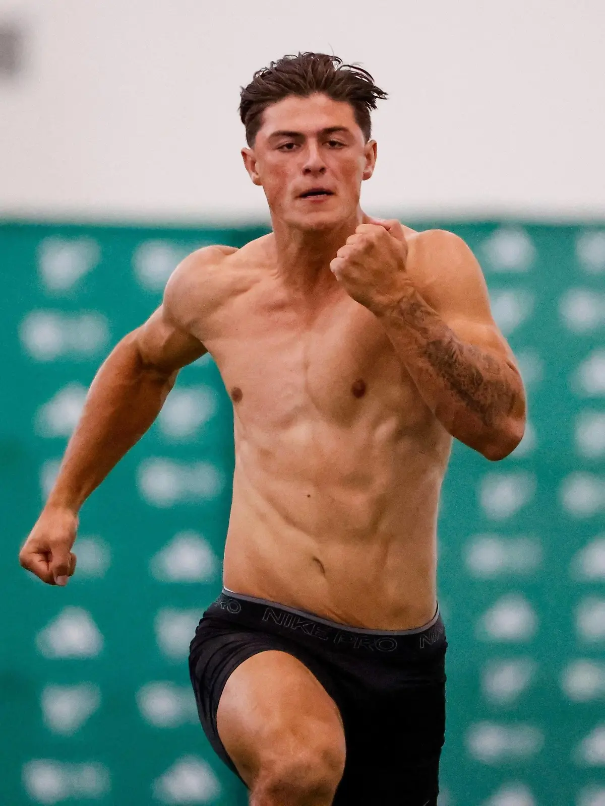 March 20, 2024, Tampa, Florida, USA: Louis Rees-Zammit, a top rugby player, runs a 40-yard dash during USF s pro day at the Morsani Football Practice Facility/Indoor Performance Facility on Wednesday, March 20, 2024, in Tampa. Tampa USA - ZUMAs70_ 20240320_zan_s70_040 Copyright: xJeffereexWoox