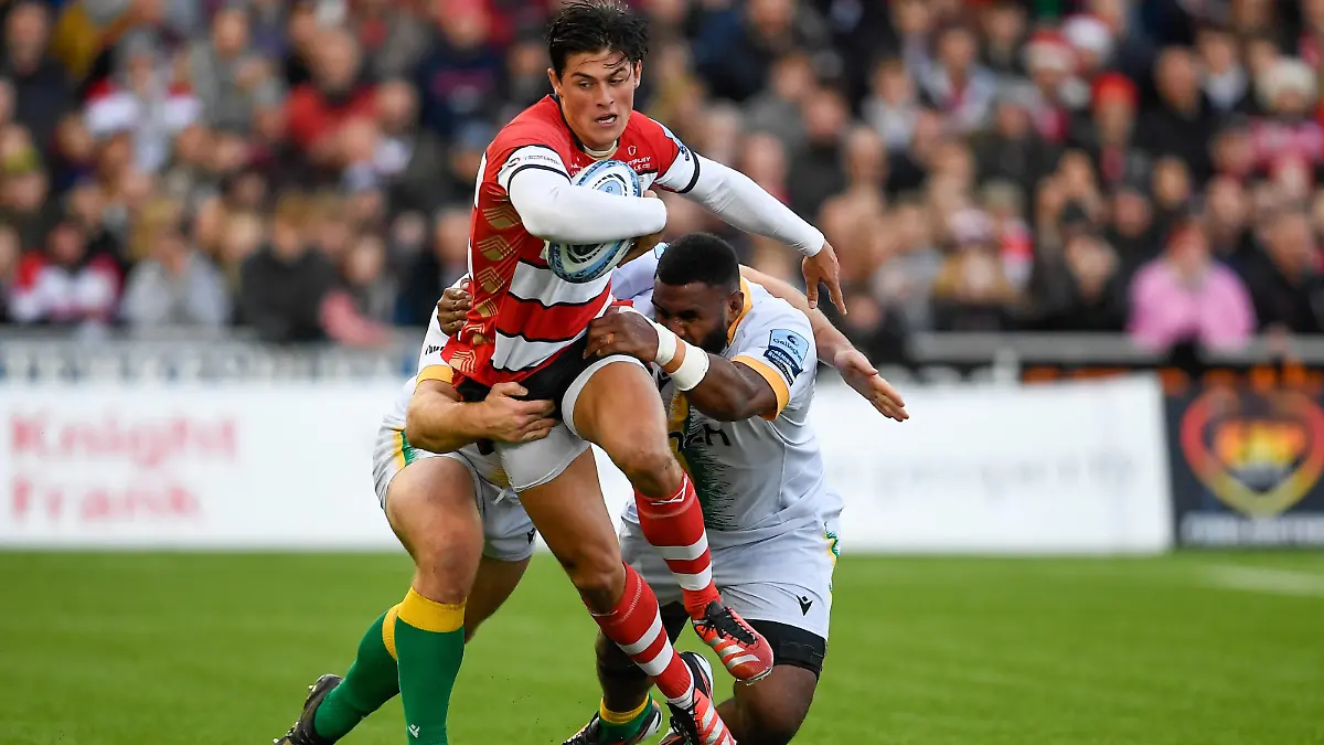 Gloucester Rugby v Northampton Saints Gallagher Premiership Rugby 23/12/2023. Gloucester Rugby Wing Louis Rees-Zammit 14 is tackled during the Gallagher Premiership Rugby match between Gloucester Rugby and Northampton Saints at the Kingsholm Stadium, Gloucester, United Kingdom on 23 December 2023. Editorial use only , Copyright: xWaynexTuckwellx PSI-18678-0062