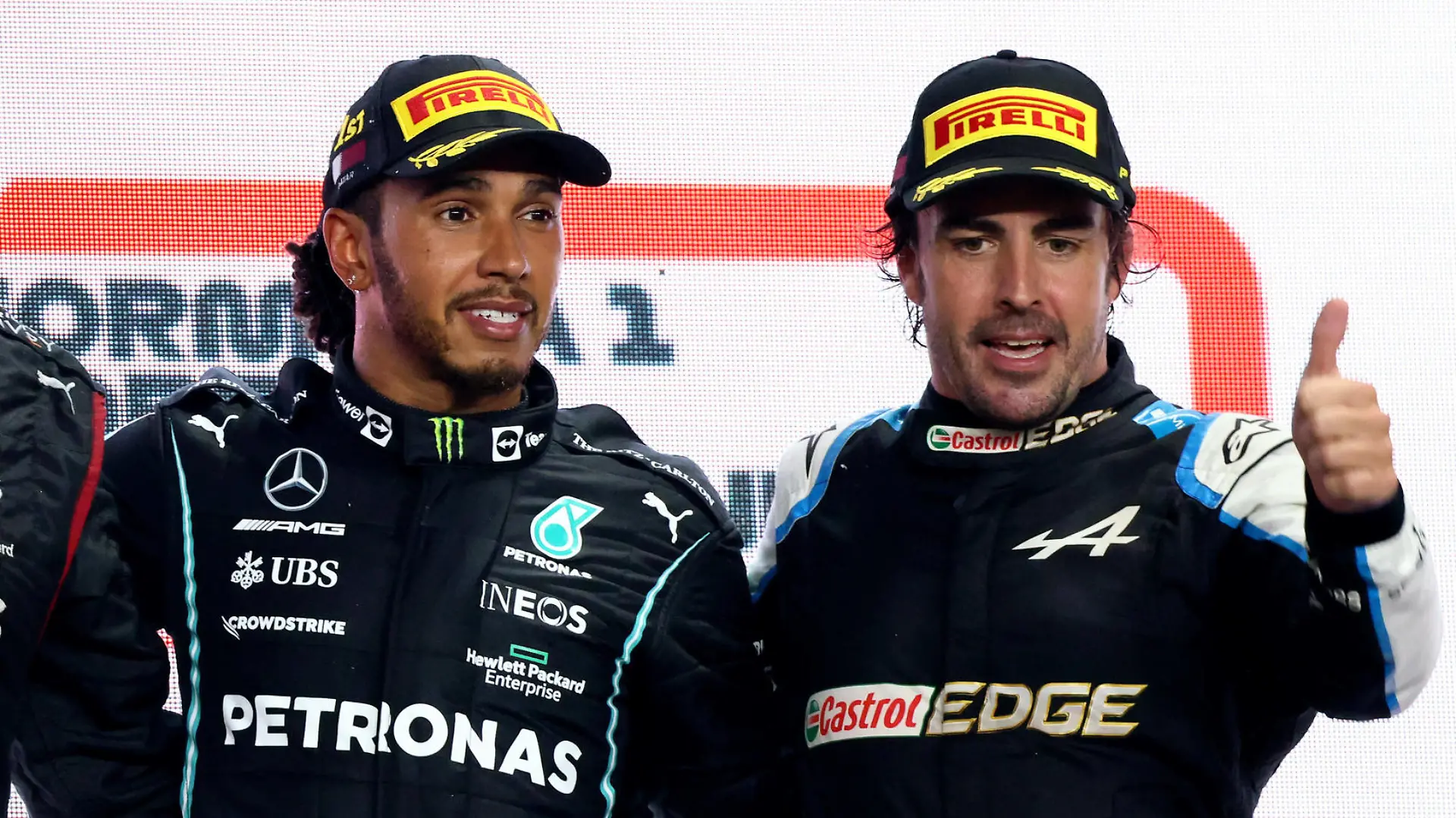 Formula 1 2021: Qatar GP LOSAIL INTERNATIONAL CIRCUIT, QATAR - NOVEMBER 21: Max Verstappen, Red Bull Racing, 2nd position, the Mercedes trophy delegate, Sir Lewis Hamilton, Mercedes, 1st position, and Fernando Alonso, Alpine F1, 3rd position, on the podium during the Qatar GP at Losail International Circuit on Sunday November 21, 2021 in Losail, Qatar. Photo by Steve Etherington / LAT Images Images PUBLICATIONxINxGERxSUIxAUTxHUNxONLY GP2120_154719SNE30570 