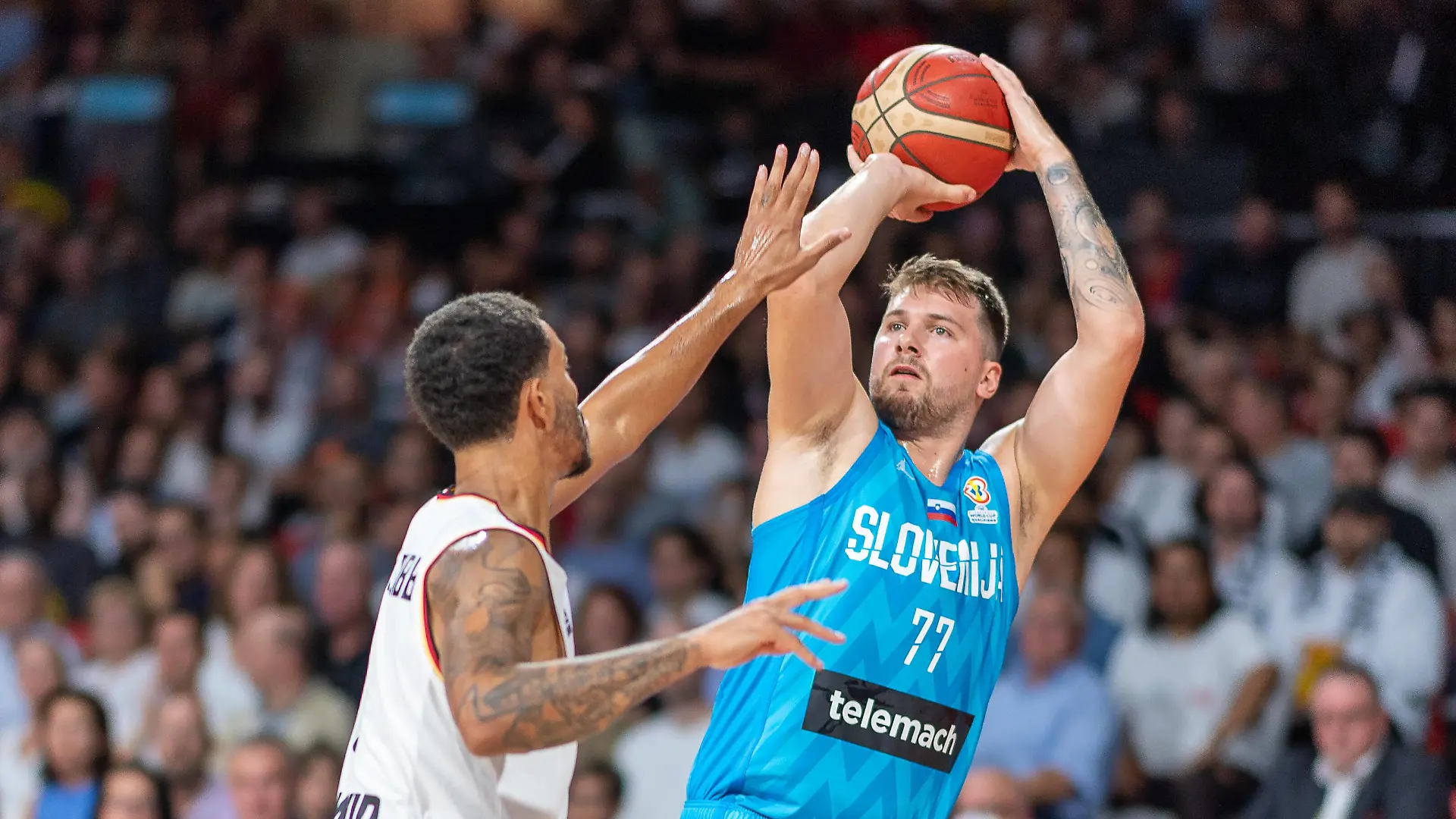 Luka Doncic Slowenien, 77, GER, Germany vs. Slovenia, Basketball, World Cup Qualifier, 2nd Round, Group J, 28.08.2022, GER, Germany vs. Slovenia, Basketball, World Cup Qualifier, 2nd Round, Group J, 28.08.2022 Munich *** Luka Doncic Slovenia, 77 , GER, Germany vs Slovenia, Basketball, World Cup Qualifier, 2nd Round, Group J, 28 08 2022, GER, Germany vs Slovenia, Basketball, World Cup Qualifier, 2nd Round, Group J, 28 08 2022 Munich Copyright: xSaschaxWaltherx EP_SWA