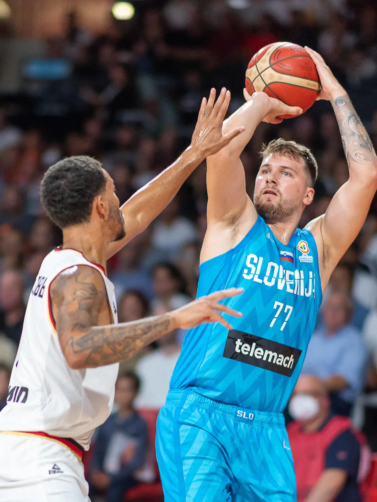 Luka Doncic Slowenien, 77, GER, Germany vs. Slovenia, Basketball, World Cup Qualifier, 2nd Round, Group J, 28.08.2022, GER, Germany vs. Slovenia, Basketball, World Cup Qualifier, 2nd Round, Group J, 28.08.2022 Munich *** Luka Doncic Slovenia, 77 , GER, Germany vs Slovenia, Basketball, World Cup Qualifier, 2nd Round, Group J, 28 08 2022, GER, Germany vs Slovenia, Basketball, World Cup Qualifier, 2nd Round, Group J, 28 08 2022 Munich Copyright: xSaschaxWaltherx EP_SWA 