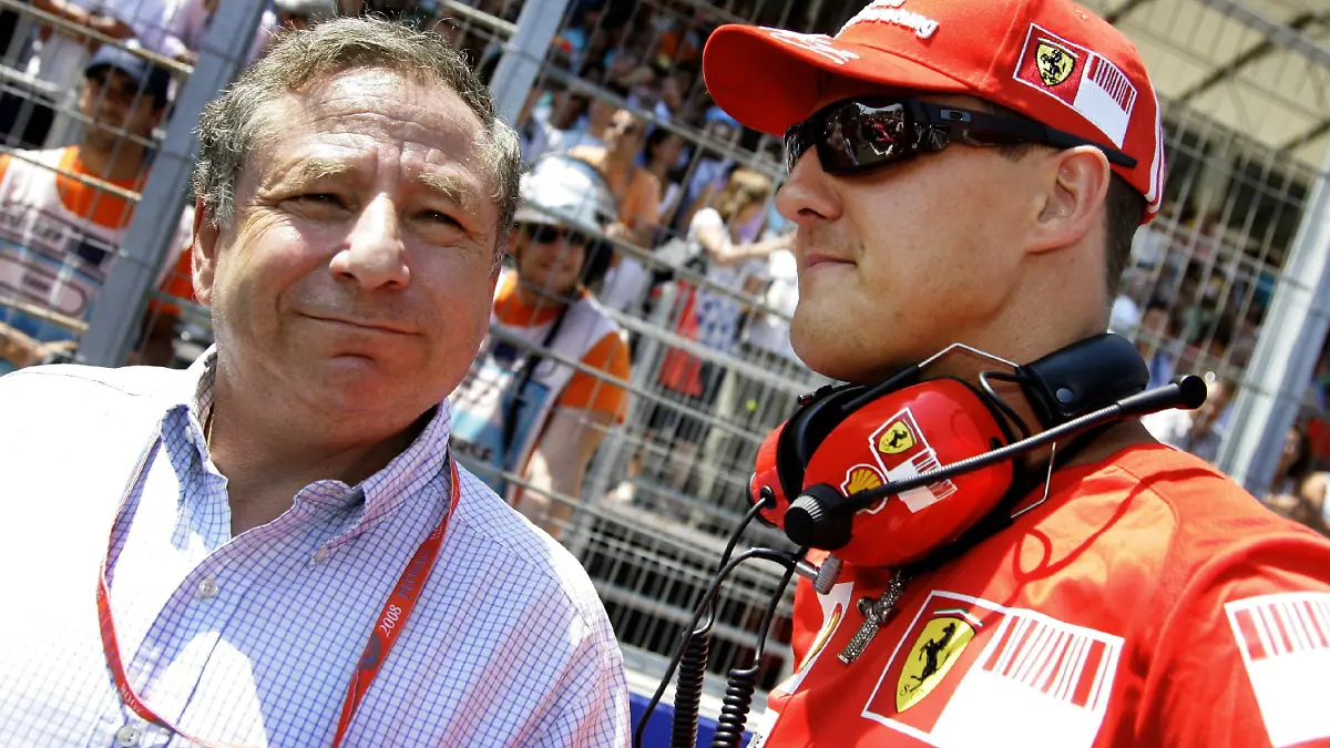 ARCHIV - Der ehemalige Formel-1-Fahrer Michael Schumacher (r) und Jean Todt, Teamchef von Ferrari, aufgenommen beim GP Spanien in Valencia (Archivfoto vom 24.08.2008). Formel-1-Rekordweltmeister Michael Schumacher hat seine Unterstützung für Jean Todt als neuen Präsidenten des Internationalen Automobilverbandes FIA verstärkt. Schumacher empfahl in einem persönlichen Brief an alle Präsidenten der nationalen FIA-Verbände die Wahl seines Freundes und früheren Teamchefs bei Ferrari. Foto: Felix Heyder (zu dpa 0660 vom 14.10.2009) +++(c) dpa - Bildfunk+++