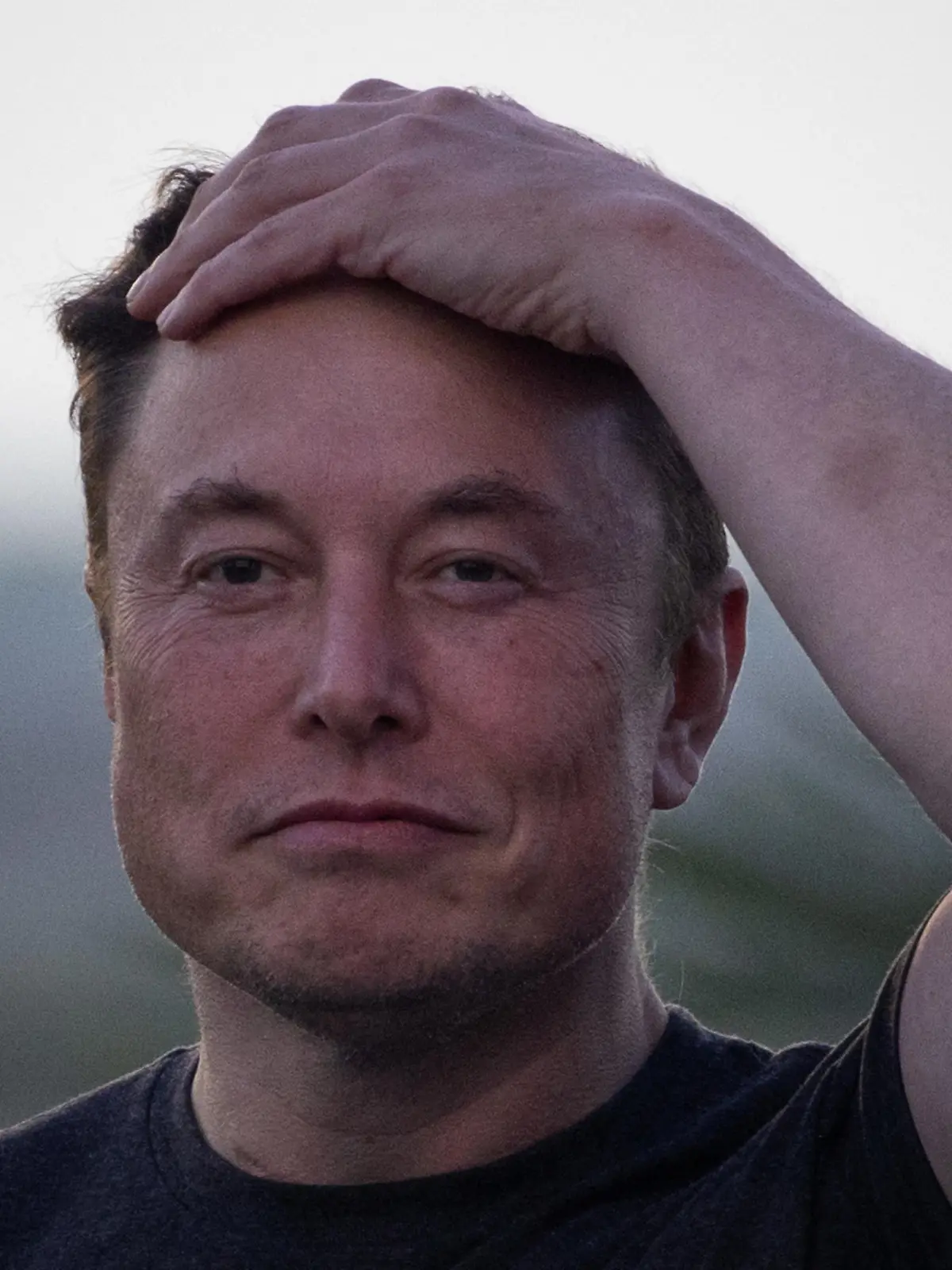SpaceX Chief Engineer Elon Musk takes part in a joint news conference with T-Mobile CEO Mike Sievert (not pictured) at the SpaceX Starbase, in Brownsville, Texas, U.S., August 25, 2022. REUTERS/Adrees Latif