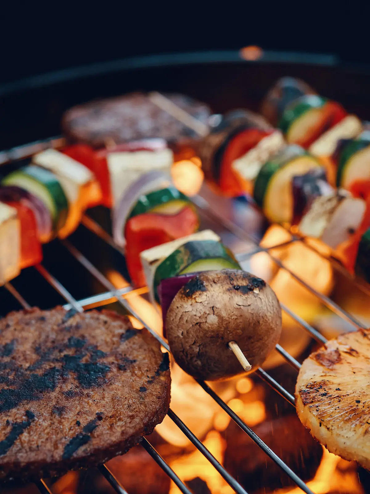 Preparing Vegan Skewers and Vegan Burger Patties and Vegetables for BBQ Grill