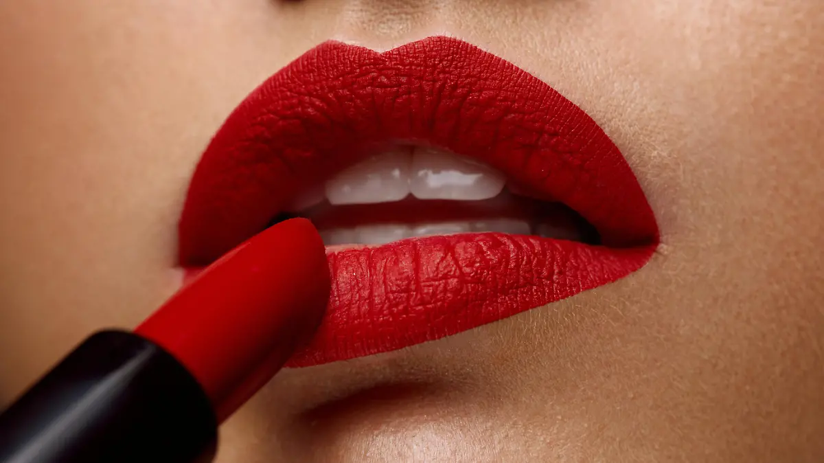 Red Lipstick. Closeup Of Woman Face With Bright Red Matte Lipstick On Full Lips. Beautiful Girl Applying Rouge Lipstick OnmSexy Soft Plump Lip. Beauty Cosmetics, Makeup Concept. High Resolution Image