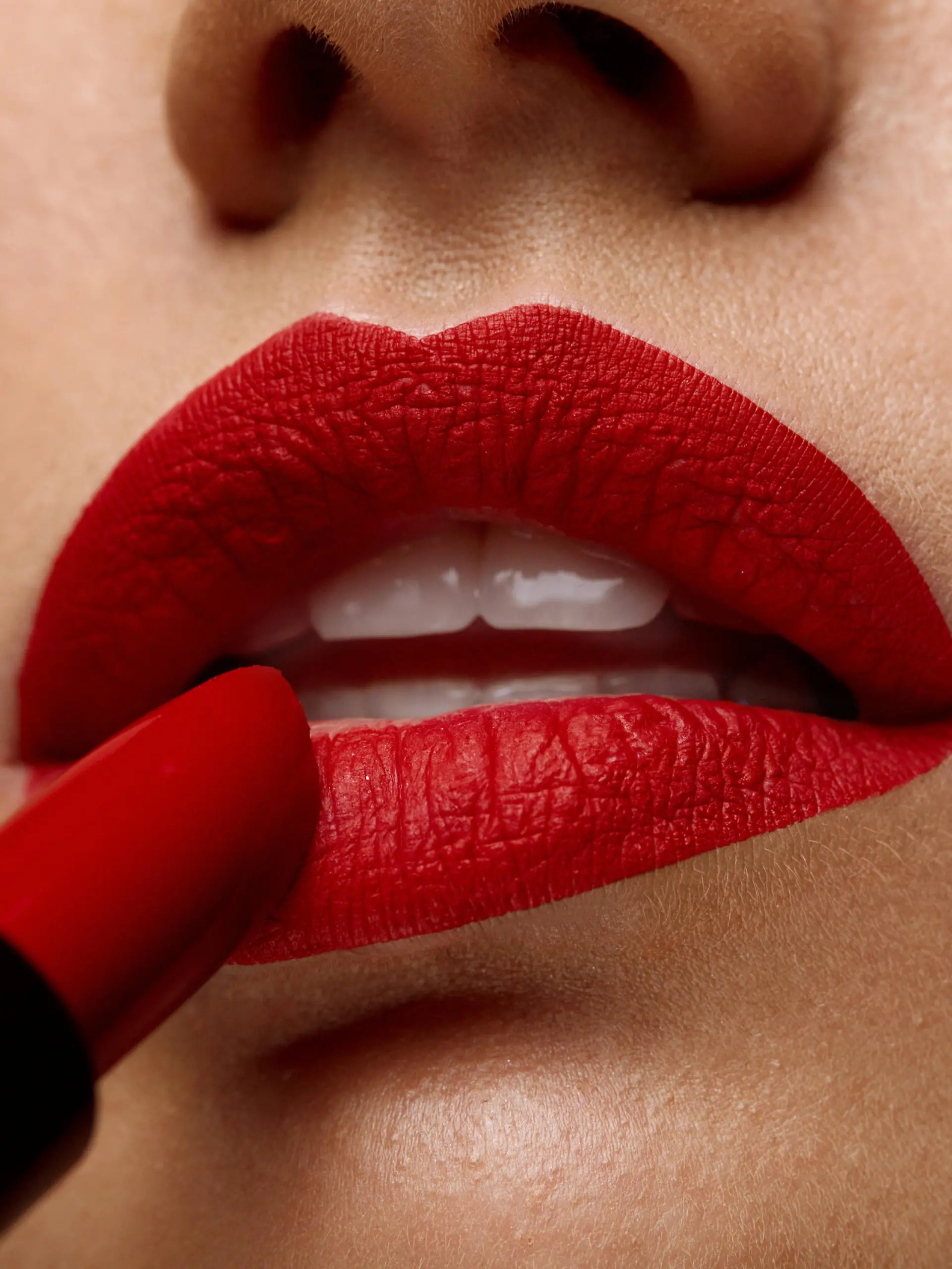 Red Lipstick. Closeup Of Woman Face With Bright Red Matte Lipstick On Full Lips. Beautiful Girl Applying Rouge Lipstick OnmSexy Soft Plump Lip. Beauty Cosmetics, Makeup Concept. High Resolution Image