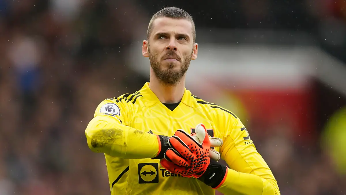 Manchester United's goalkeeper David de Gea stands on the pitch during the English Premier League soccer match between Manchester United and Aston Villa at the Old Trafford stadium in Manchester, England, Sunday, April 30, 2023. (AP Photo/Dave Thompson)