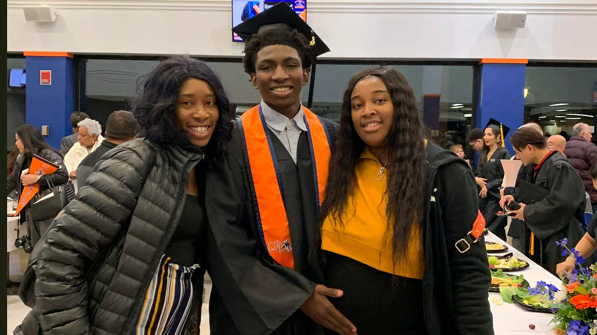 This 2019 photo provided by Porscha Banks, shows Dexter Reed, center, along with his mother Nicole Banks and sister Porscha Banks. Reed died March 21, 2024 after Chicago Police officers shot him during a traffic stop.  Plainclothes Chicago police officers fired nearly 100 gun shots over 41 seconds during a traffic stop that left Dexter Reed dead and one officer injured, according to graphic video footage a police oversight agency released Tuesday, April 9. (Porscha Banks via AP).