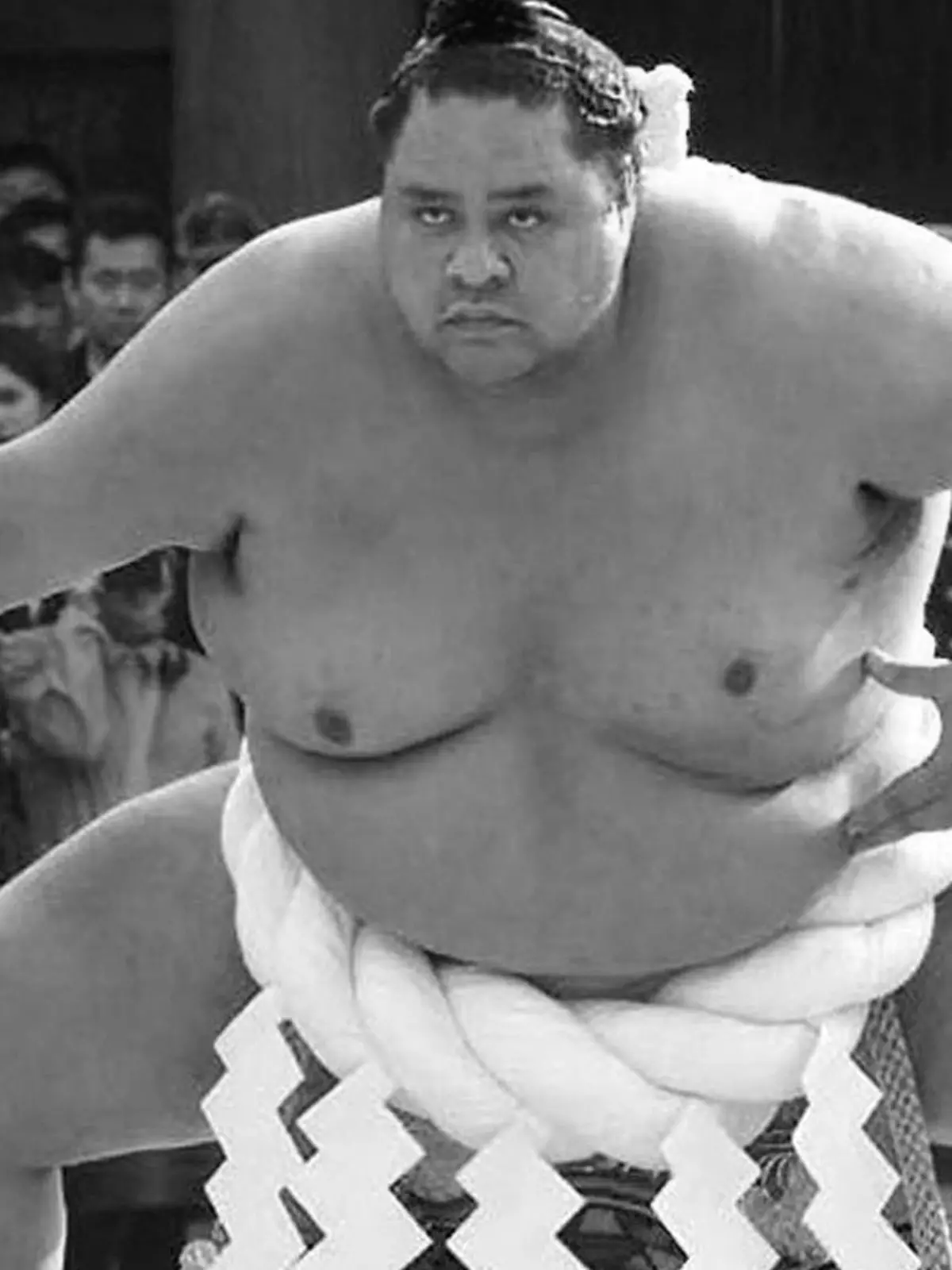 FILE PHOTO: Hawaiian-born sumo wrestler Akebono, Japan's first foreign-born yokozuna or sumo grand champion, seen performing a sacred ring-entering ritual at Tokyo's Meiji Shrine. Picture taken Jan  6, 2000./File Photo