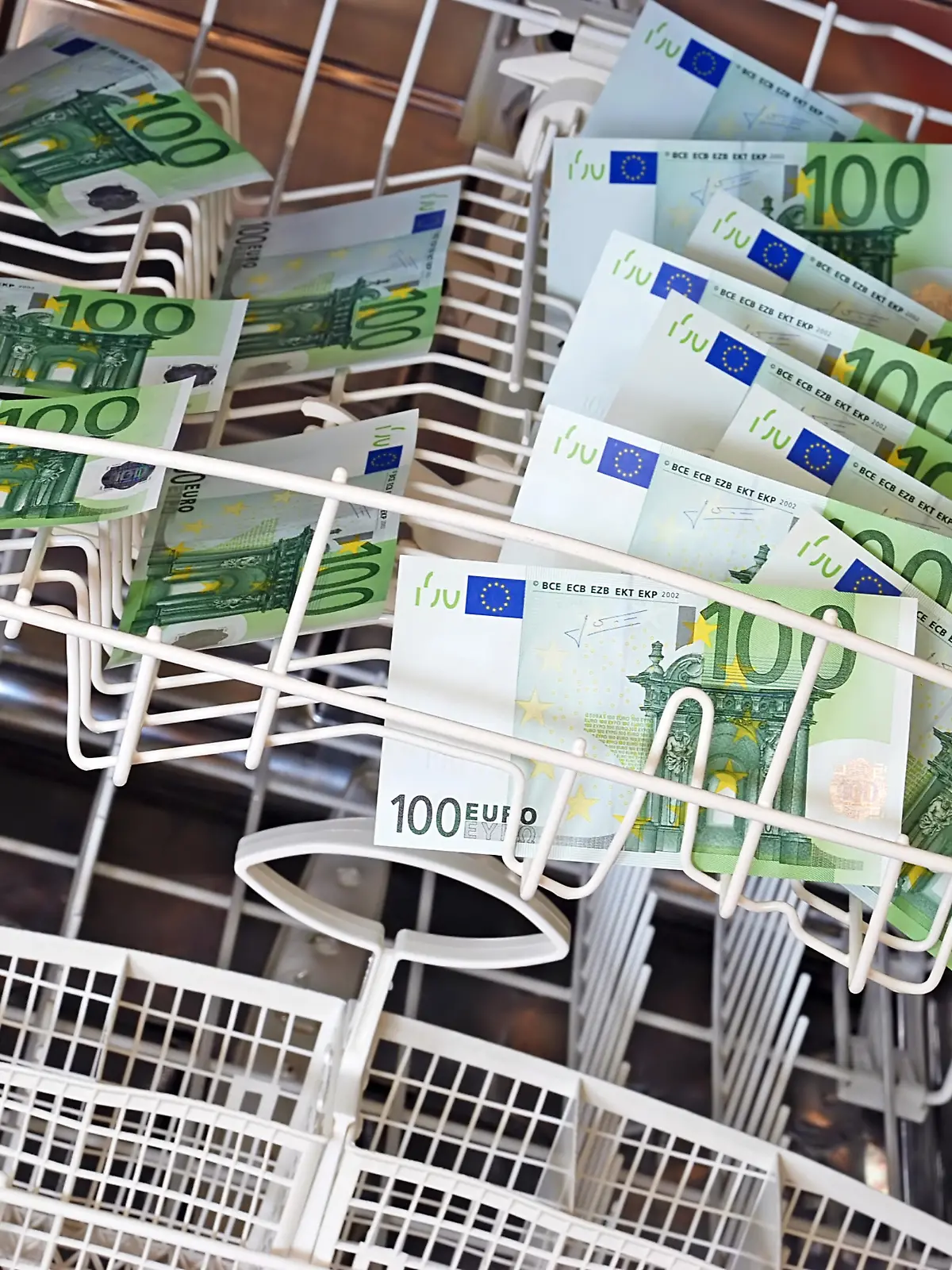 clean new hundred euro banknotes in dishwasher