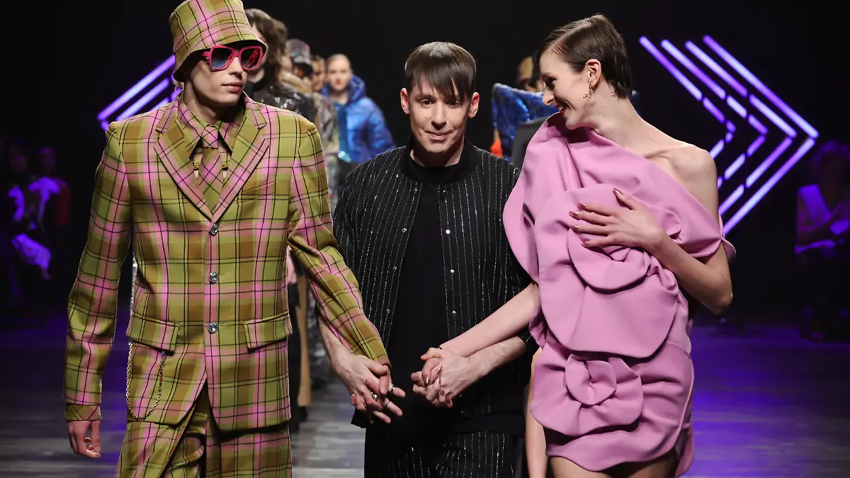 BERLIN, GERMANY - FEBRUARY 07: Designer Kilian Kerner comes out to greet the audience on the runway after the Kilian Kerner Runway Show as part of the W.E4. Fashion Day during Berlin Fashion Week AW24 at Verti Music Hall on February 07, 2024 in Berlin, Germany. (Photo by Andreas Rentz/Getty Images for Kilian Kerner)