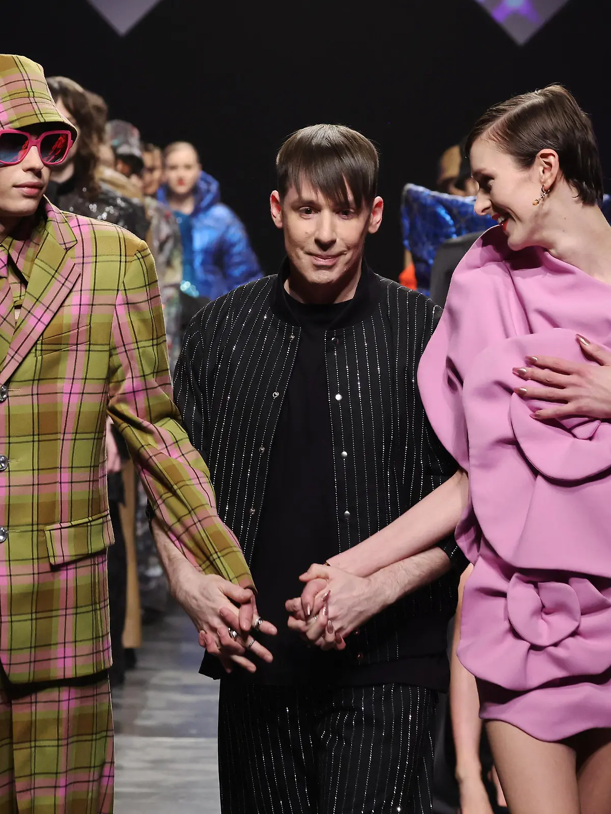 BERLIN, GERMANY - FEBRUARY 07: Designer Kilian Kerner comes out to greet the audience on the runway after the Kilian Kerner Runway Show as part of the W.E4. Fashion Day during Berlin Fashion Week AW24 at Verti Music Hall on February 07, 2024 in Berlin, Germany. (Photo by Andreas Rentz/Getty Images for Kilian Kerner)