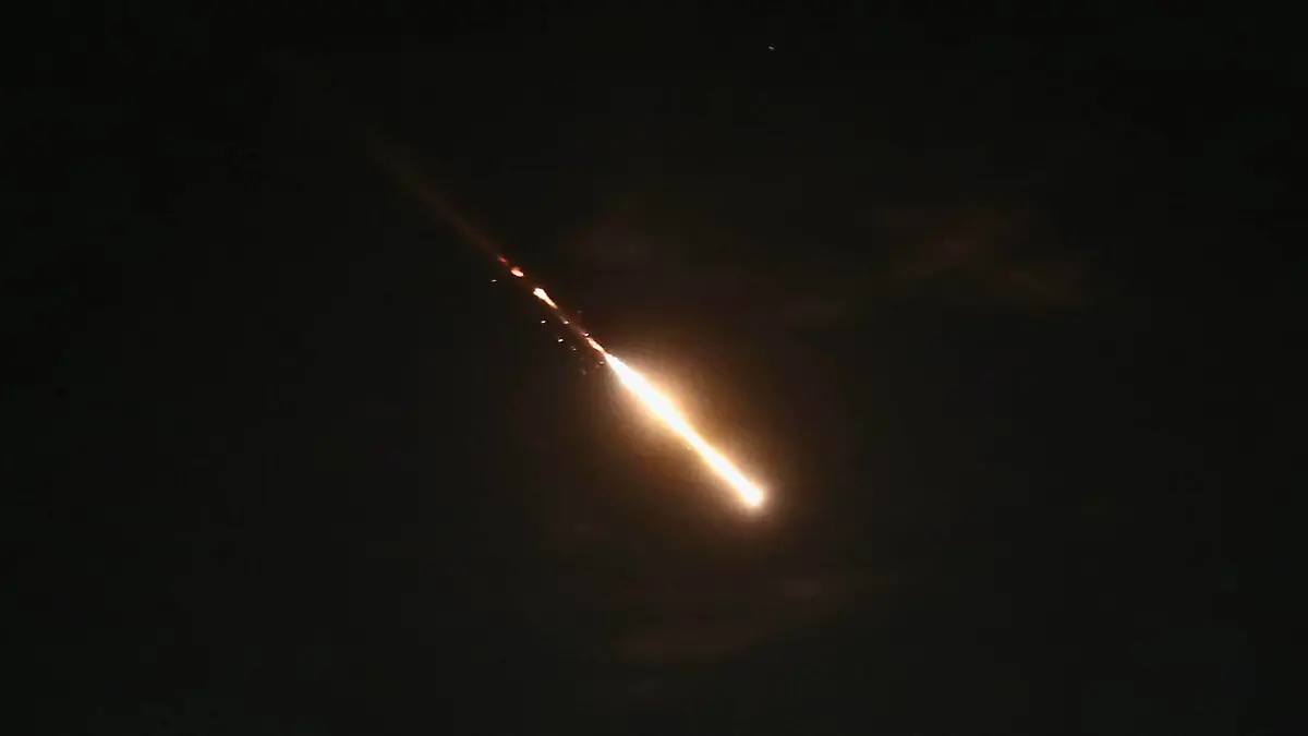 240414 -- JERUSALEM, April 14, 2024 -- This photo taken on April 14, 2024 shows flares from explosions in the sky over Jerusalem as Israel s Iron Dome anti-missile system intercepts missiles and drones from Iran. A combined attack of dozens of ballistic missiles and hundreds of drones from Iran triggered air raid alerts across Israel early on Sunday, the Israeli army said, as residents reported multiple bombings were heard. Photo by /Xinhua FOCUS MIDEAST-JERUSALEM-IRAN-DRONE-MISSILE ATTACKS-ISRAEL JamalxAwad PUBLICATIONxNOTxINxCHN