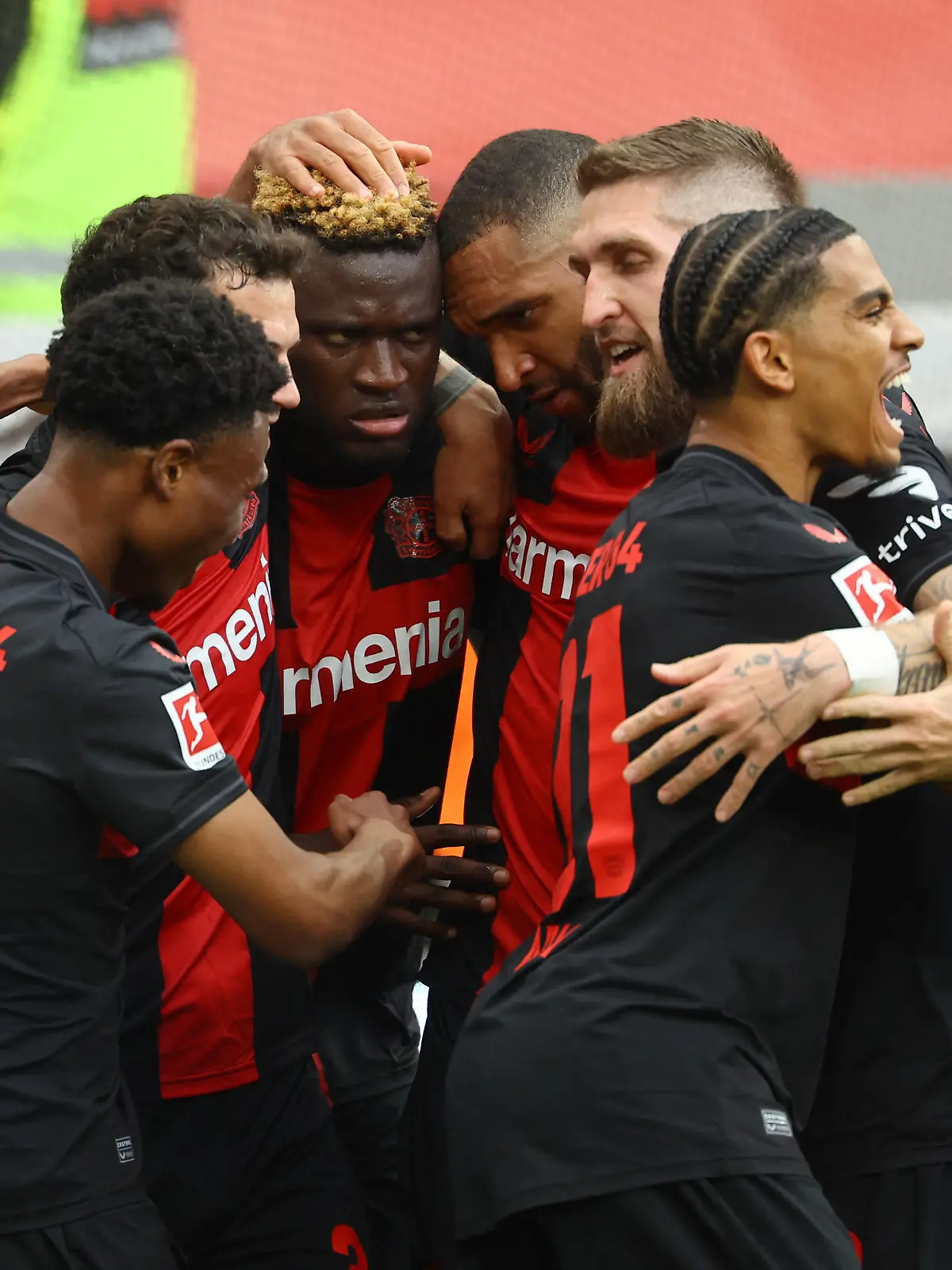 Soccer Football - Bundesliga - Bayer Leverkusen v Werder Bremen - BayArena, Leverkusen, Germany - April 14, 2024 Bayer Leverkusen's Victor Boniface celebrates scoring their first goal with teammates REUTERS/Kai Pfaffenbach DFL REGULATIONS PROHIBIT ANY USE OF PHOTOGRAPHS AS IMAGE SEQUENCES AND/OR QUASI-VIDEO.