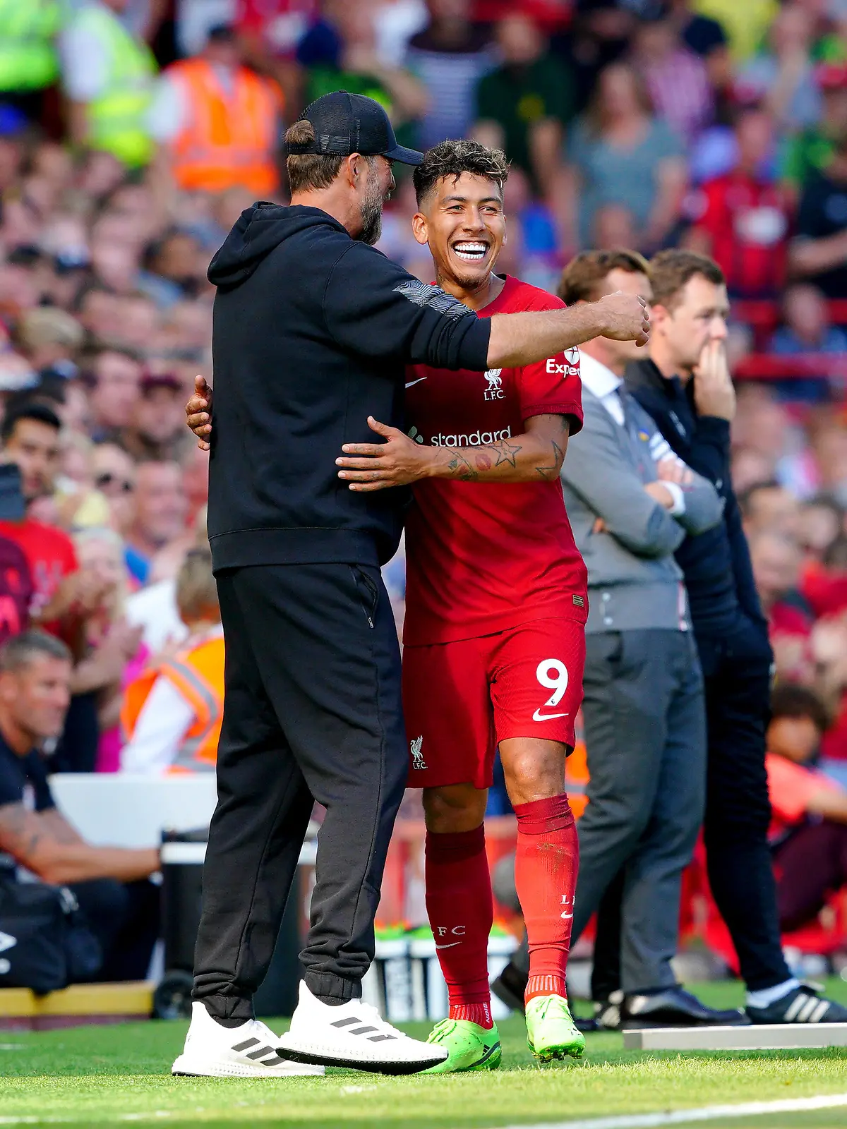 Liverpool v Bournemouth - Premier League - Anfield. Liverpool's Roberto Firmino hugs manager Jurgen Klopp after being substituted during the Premier League match at Anfield, Liverpool. Picture date: Saturday August 27, 2022. See PA story SOCCER Liverpool. Photo credit should read: Peter Byrne/PA Wire. RESTRICTIONS: EDITORIAL USE ONLY No use with unauthorised audio, video, data, fixture lists, club/league logos or "live" services. Online in-match use limited to 120 images, no video emulation. No use in betting, games or single club/league/player publications. URN:68489252