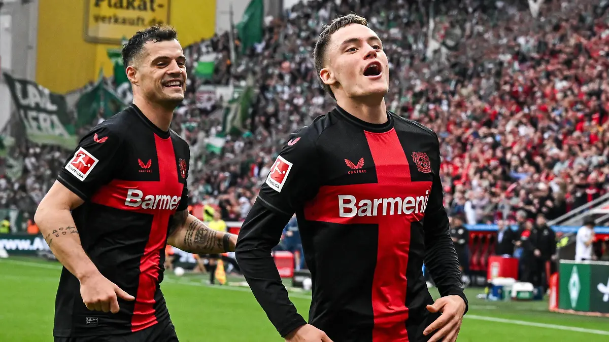 LEVERKUSEN - Florian Wirtz of Bayer 04 Leverkusen celebrates the 3-0 during the Bundesliga match between Bayer 04 Leverkusen and Werder Bremen at the Bay Arena on April 14, 2024 in Leverkusen, Germany. ANP Hollandse Hoogte GERRIT VAN COLOGNE Bundesliga 2023/24 xVIxANPxSportx/xGerritxvanxKeulenxIVx 496022380 originalFilename: 496022380.jpg