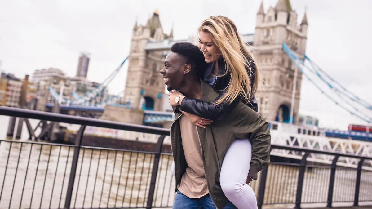 A young couple enjoying each others company outdoors in London