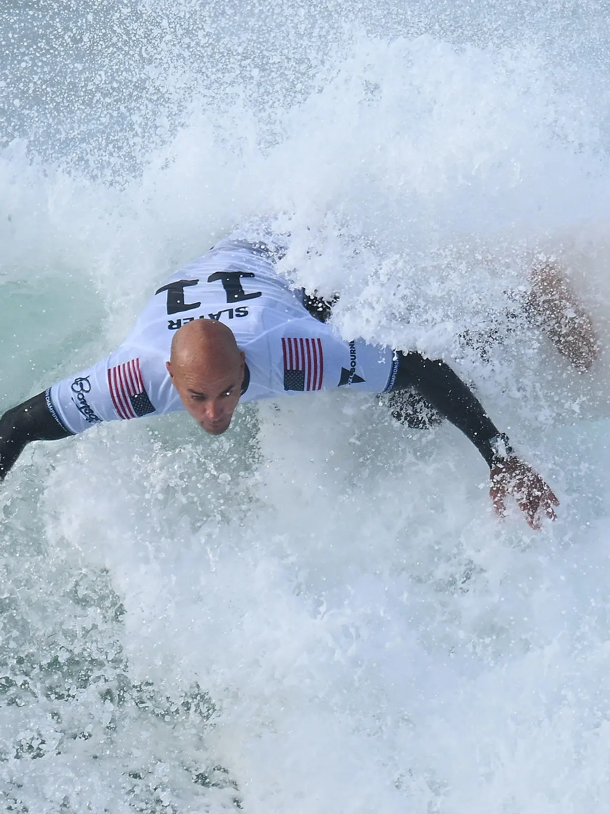 BELLS BEACH, AUSTRALIA - MARCH 26: Kelly Slater of the United States surfs in their first heat during the 2024 Rip Curl Pro Bells Beach on March 26, 2024 in Bells Beach, Australia. (Photo by Morgan Hancock/Getty Images)