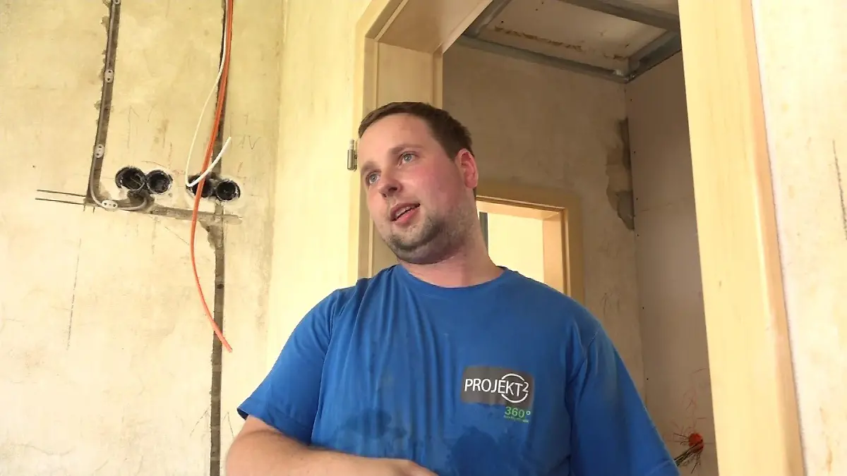 André Mechelhoff im blauen Shirt