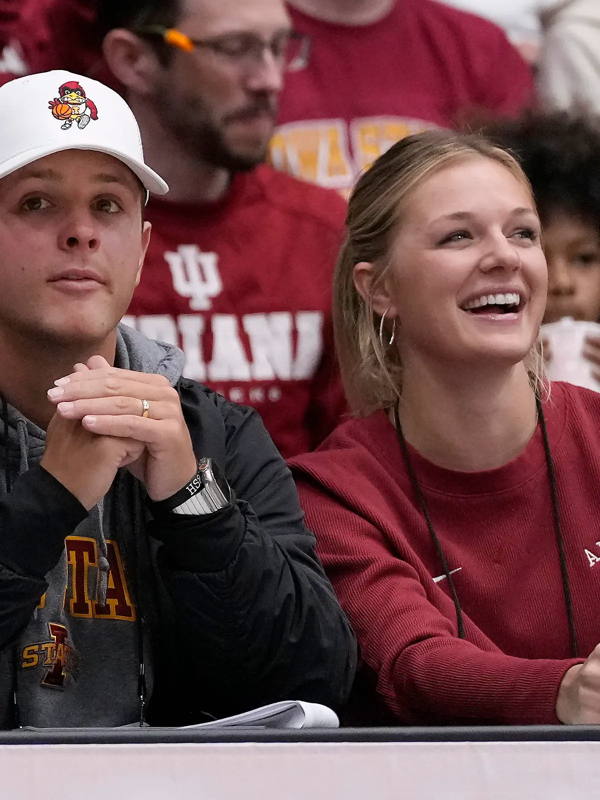 San Francisco 49ers quarterback Brock Purdy, left, and his wife, Jenna, watch players warm up before a second-round college basketball game in the women's NCAA Tournament between Stanford and Iowa State in Stanford, Calif., Sunday, March 24, 2024. (AP Photo/Jeff Chiu)