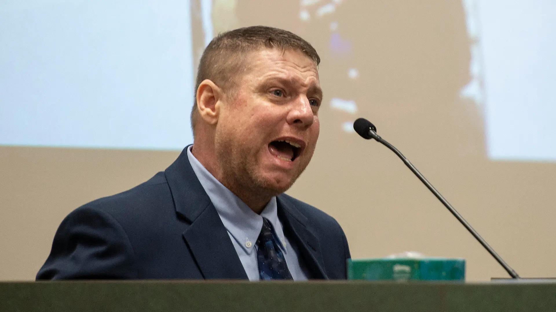 FILE - Jacob Blair Scott, who is accused of sexually assaulting a minor, cries out while being cross-examined by Assistant District Attorney Justin Lovorn, during his trial in Jackson County Circuit Court in Pascagoula, Miss., on Wednesday, June 1, 2022. On Monday, Aug. 22, 2022, Scott pleaded guilty in federal court to faking his own death off the Alabama coast to try to avoid sexual abuse charges in Mississippi. (Hannah Ruhoff/The Sun Herald via AP, File)