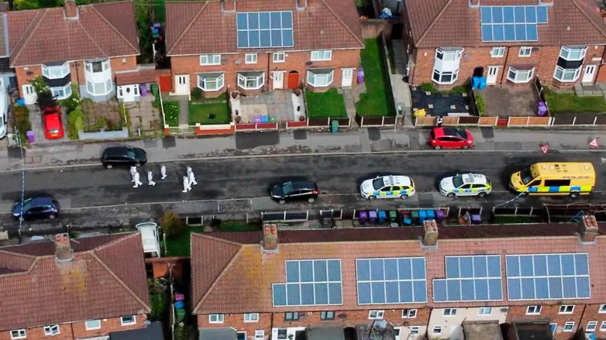 Knotty Ash incident. An aerial view of forensics officers at the scene in Kingsheath Avenue, Knotty Ash, Liverpool, where a nine-year-old girl has been fatally shot. Officers from Merseyside Police have started a murder investigation after attending a house at 10pm Monday following reports that an unknown male had fired a gun inside the property. Picture date: Tuesday August 23, 2022. See PA story POLICE KnottyAsh. Photo credit should read: Peter Byrne/PA Wire URN:68436274