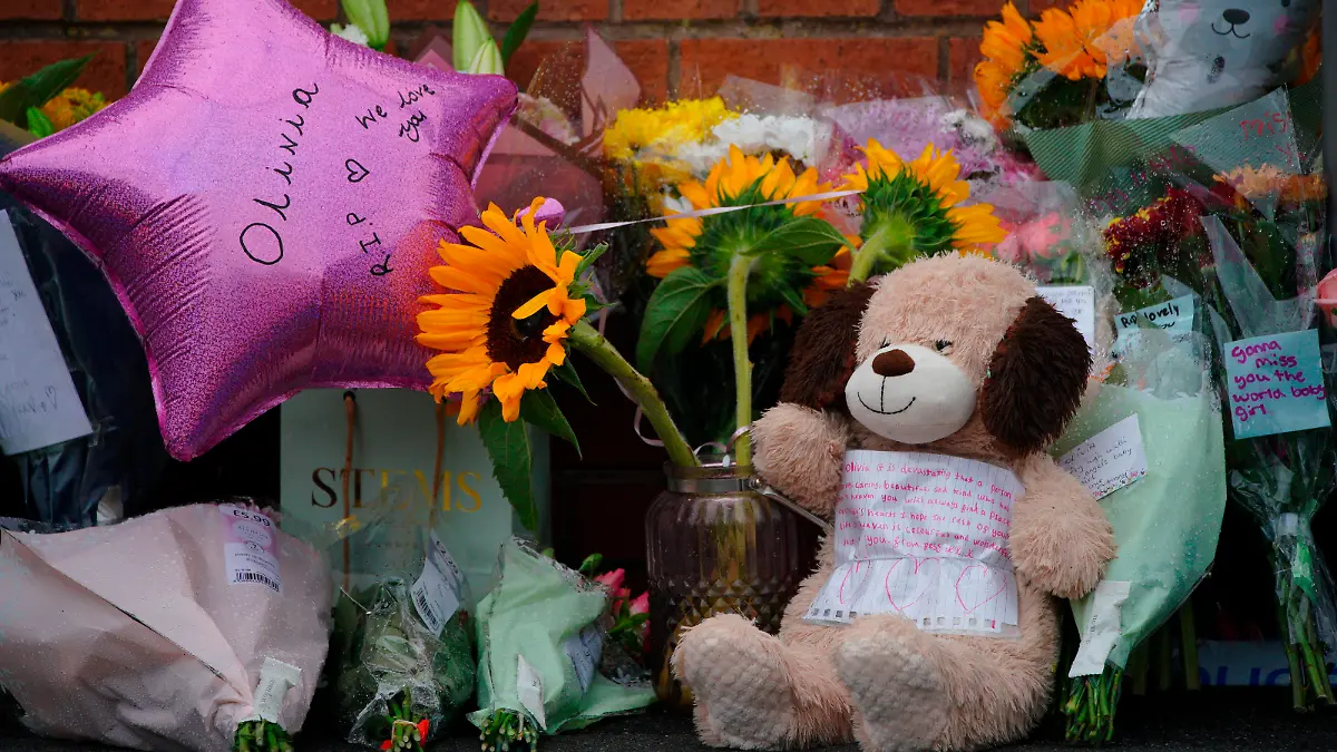 Olivia Pratt-Korbel death. Tributes left in Kingsheath Avenue, Knotty Ash, Liverpool, where nine-year-old Olivia Pratt-Korbel was fatally shot on Monday night. The people of Liverpool have been urged to turn in the masked gunman who killed Olivia as he chased his intended target into her home. Picture date: Wednesday August 24, 2022. A 35-year-old man, unknown to her family, ran into their terraced house in an attempt to get away from a shooter. Olivia's mother Cheryl Korbel, 46, was shot in the wrist as she tried to close the door on the gunman while Olivia stood behind her. See PA story POLICE KnottyAsh. Photo credit should read: Peter Byrne/PA Wire URN:68443930