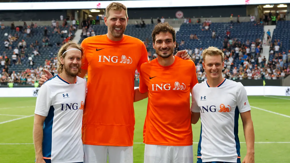 Soccer Football - Champions for Charity - Benefit match in honour of former F1 World Champion driver Michael Schumacher - Deutsche Bank Park, Frankfurt, Germany - August 24, 2022 Sebastian Vettel, Dirk Nowitzki, Mats Hummels and Mick Schumacher after the match REUTERS/Heiko Becker