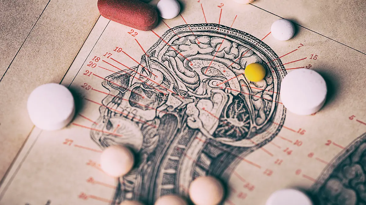 Head section with pills scattered around