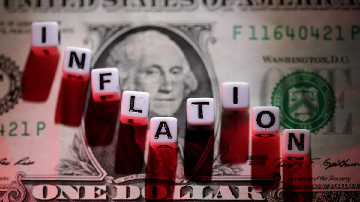 FILE PHOTO: Plastic letters arranged to read "Inflation" are placed on U.S. dollar banknote in this illustration taken, June 12, 2022. REUTERS/Dado Ruvic/Illustration/File Photo