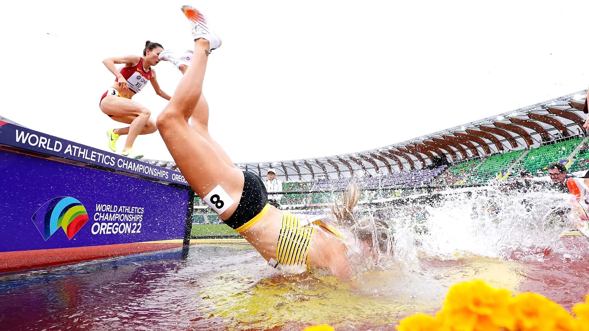 World Athletics Championships Oregon22 - Day Two - Eugene. Germany's Lea Meyer falls into the water whilst competing in the Women's 3000 Metres Steeplechase on day two of the World Athletics Championships at Hayward Field, University of Oregon in the United States. Picture date: Saturday July 16, 2022. See PA Story ATHLETICS World. Photo credit should read: Martin Rickett/PA Wire. RESTRICTIONS: Use subject to restrictions. Editorial use only, no commercial use without prior consent from rights holder. URN:67920947