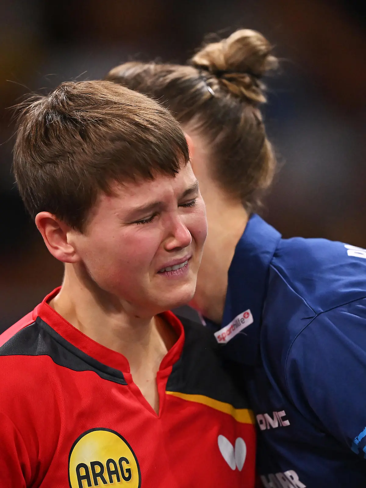 MUNICH, GERMANY - AUGUST 21: Nina Mittelham of Germany reacts upon retiring from the match with an injury, against Sofia Polcanova of Austria during the Women's Singles Gold Medal Match on day 11 of the European Championships Munich 2022 at Rudi-Sedlmayer-Halle on August 21, 2022 in Munich, Germany. (Photo by Sebastian Widmann/Getty Images)