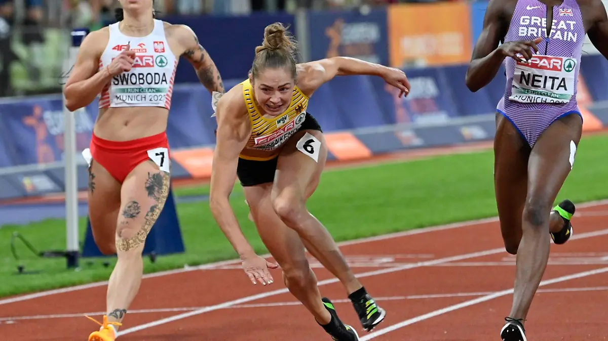 6 August 2022, Bavaria, Munich: European Championships, Athletics,100m, Women, Final at the Olympic Stadium. Gina Luckenkemper (Ct) from Germany finishes ahead of Daryll Neita (R) from Great Britain. Fourth place goes to Ewa Swoboda (L) from Poland//HMCROPIX_Sipa.1673/2208171027/Credit:Ronald Gorsic/CROPIX/SIPA/2208171038