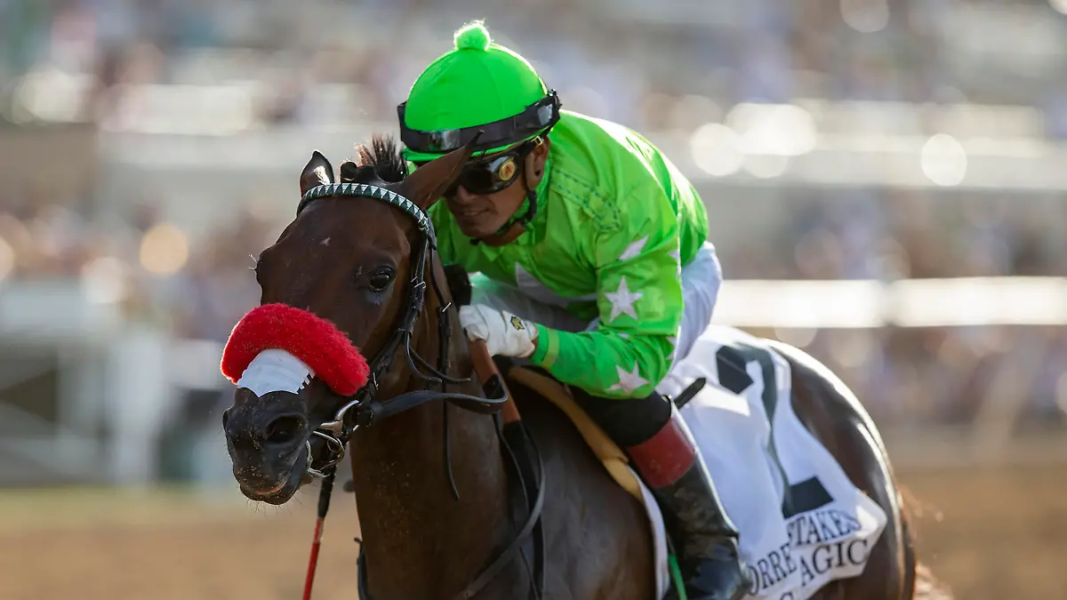 In this image provided by Benoit Photo, Vegas Magic, with Abel Cedillo aboard, wins the Grade II, $200,000 Sorrento Stakes horse race Saturday, Aug. 13, 2022, at Del Mar Thoroughbred Club in Del Mar, Calif. (Benoit Photo via AP)