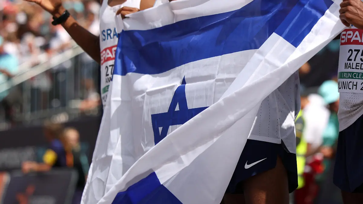 MUNICH, GERMANY - AUGUST 15: Girmaw Amare, Gashau Ayale, Yimer Getahun, Omer Ramon and Maru Teferi of Israel pose for a photograph following the Men's Marathon Final on day 5 of the European Championships Munich 2022 Koenigsplatz on August 15, 2022 in Munich, Germany. (Photo by Adam Pretty/Getty Images)