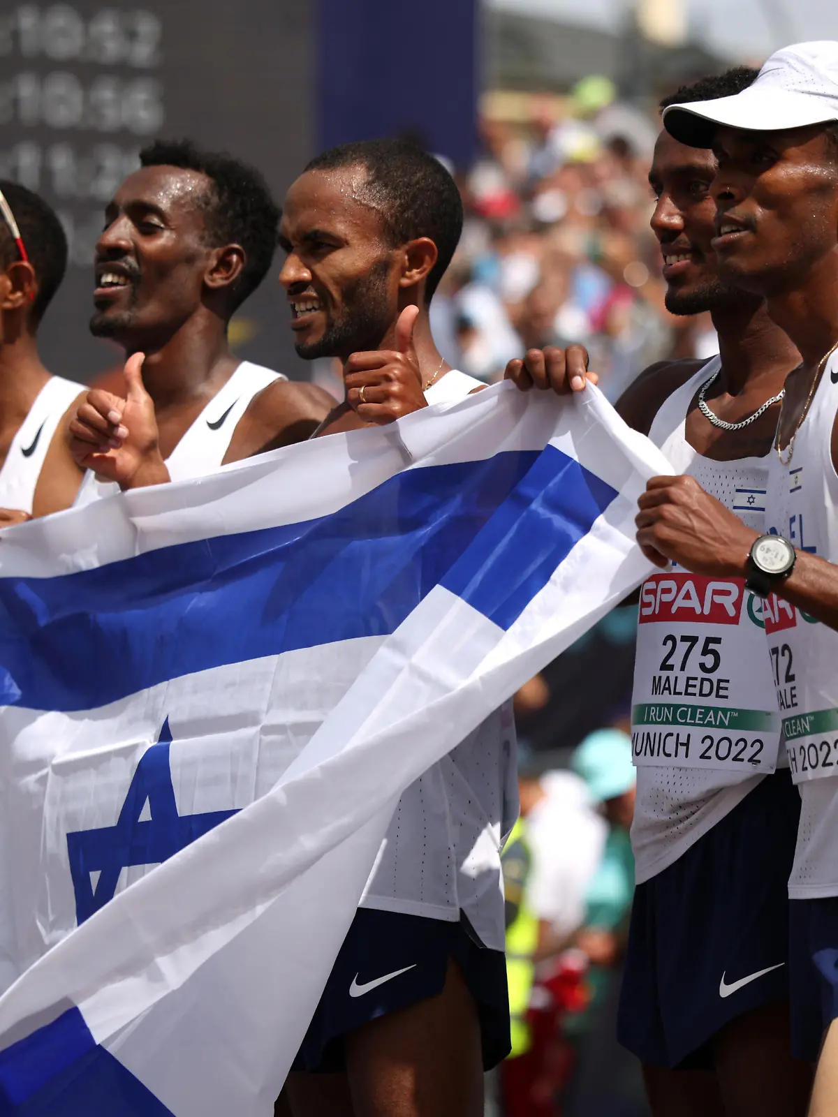 MUNICH, GERMANY - AUGUST 15: Girmaw Amare, Gashau Ayale, Yimer Getahun, Omer Ramon and Maru Teferi of Israel pose for a photograph following the Men's Marathon Final on day 5 of the European Championships Munich 2022 Koenigsplatz on August 15, 2022 in Munich, Germany. (Photo by Adam Pretty/Getty Images)
