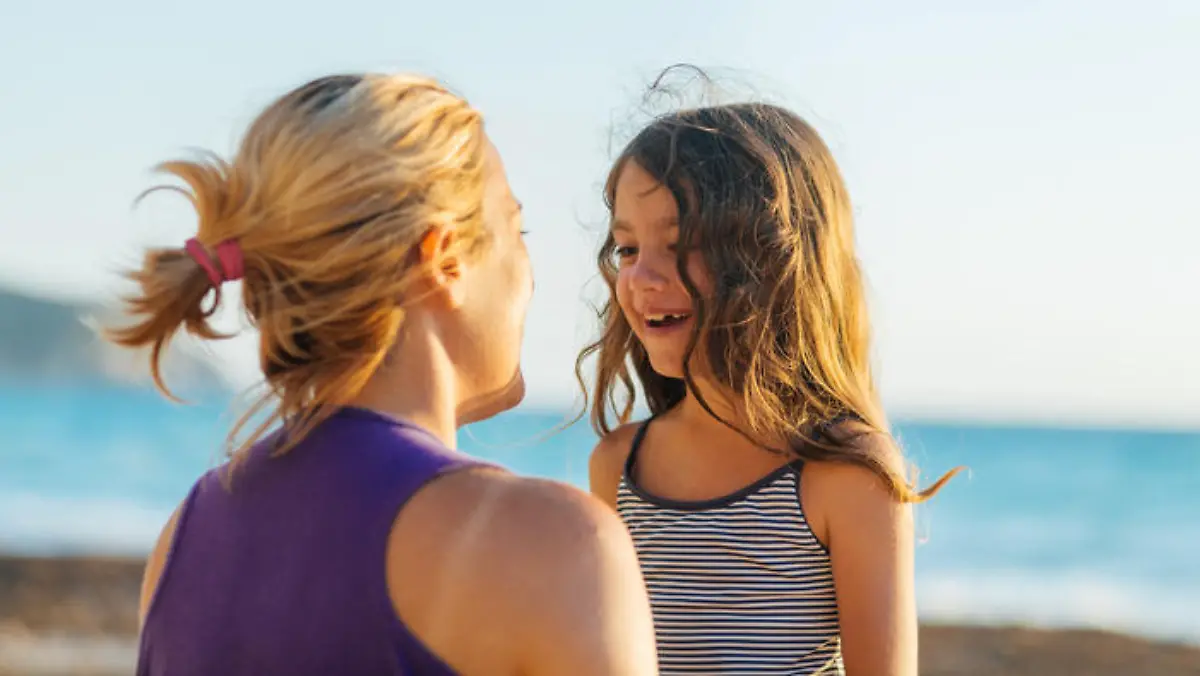 Family having enjoyable memories and bonding moments the beach on their summer vacation