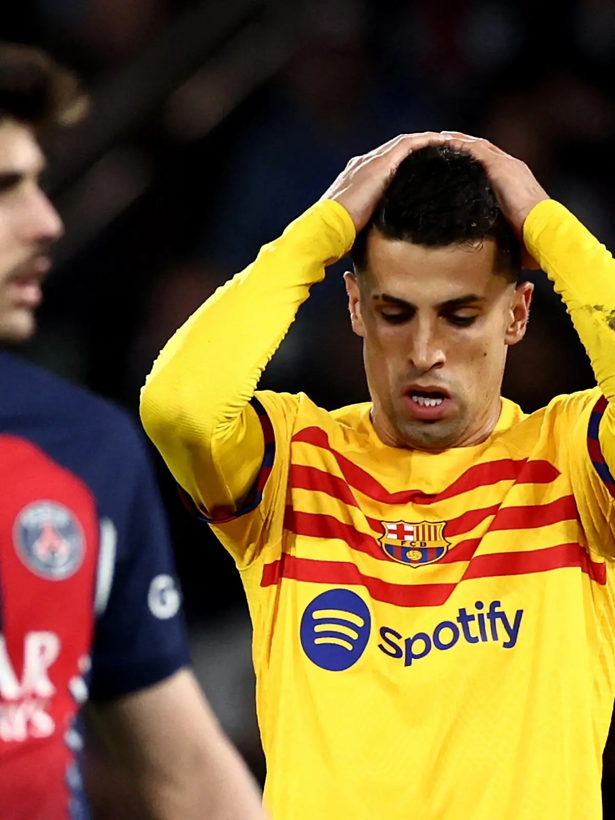 Soccer Football - Champions League - Quarter Final - First Leg - Paris St Germain v FC Barcelona - Parc des Princes, Paris, France - April 10, 2024 FC Barcelona's Joao Cancelo reacts after missing a chance to score REUTERS/Stephanie Lecocq