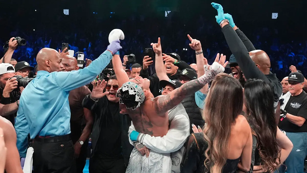 Ryan Garcia celebrates after winning a super lightweight boxing match against Devin Haney early Sunday, April 21, 2024, in New York. (AP Photo/Frank Franklin II)