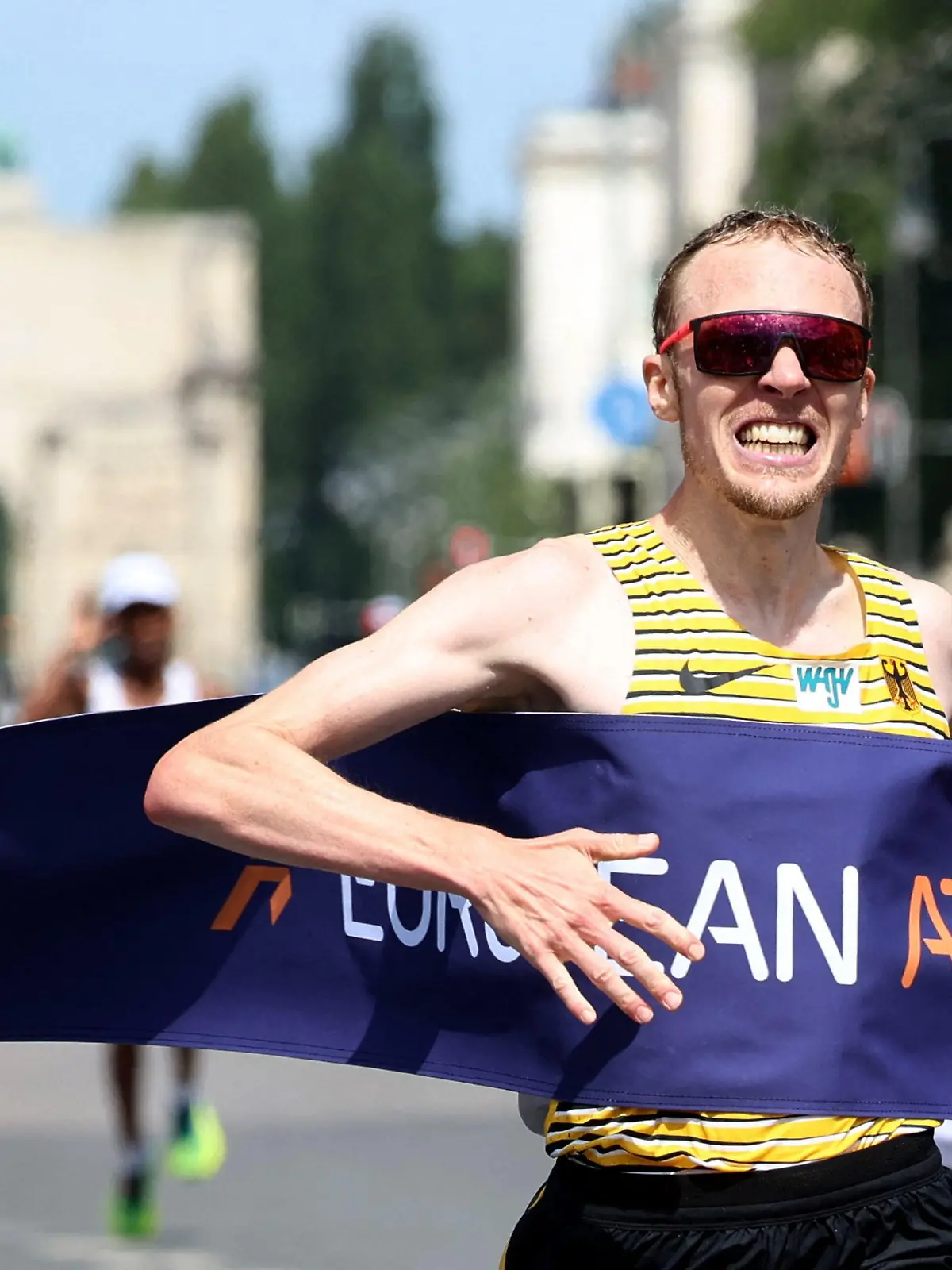 2022 European Championships - Men's Marathon - Munich, Germany - August 15, 2022 Germany's Richard Ringer crosses the line to win the men's marathon REUTERS/Lukas Barth