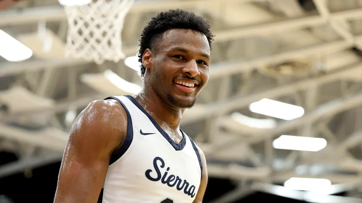 FILE - Sierra Canyon's Bronny James (0) smiles during a high school basketball game against Christopher Columbus at the Hoophall Classic, Monday, Jan. 16, 2023, in Springfield, Mass. Bronny James, son of NBA superstar LeBron James, was hospitalized after going into cardiac arrest while participating in a practice at Southern California on Monday, July 24, 2023. (AP Photo/Gregory Payan, File)